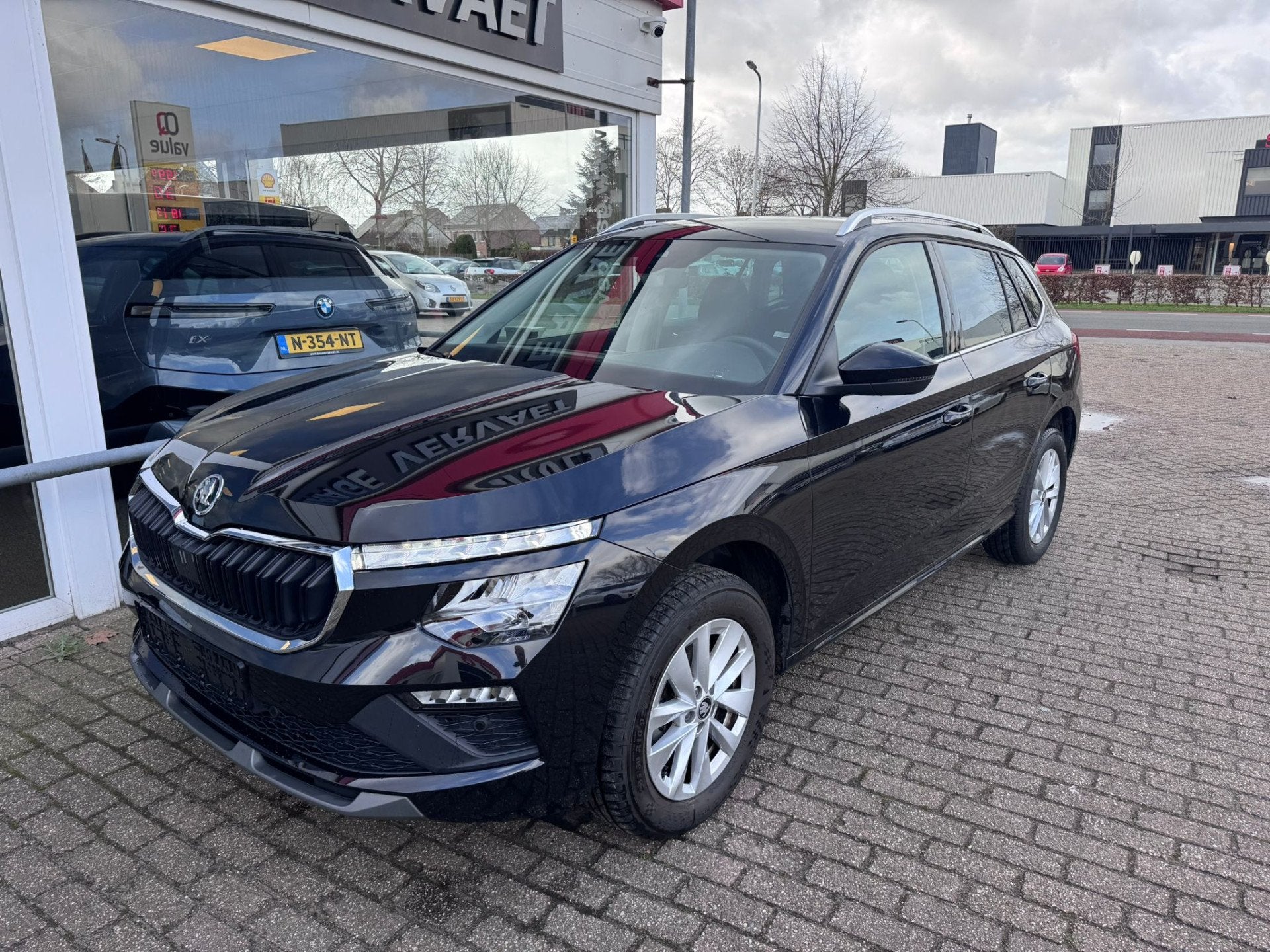 Skoda Kamiq 1.0 TSI Business Edition (bj 2025, automaat), Auto's, Stof, Gebruikt, Zwart, 1200 kg