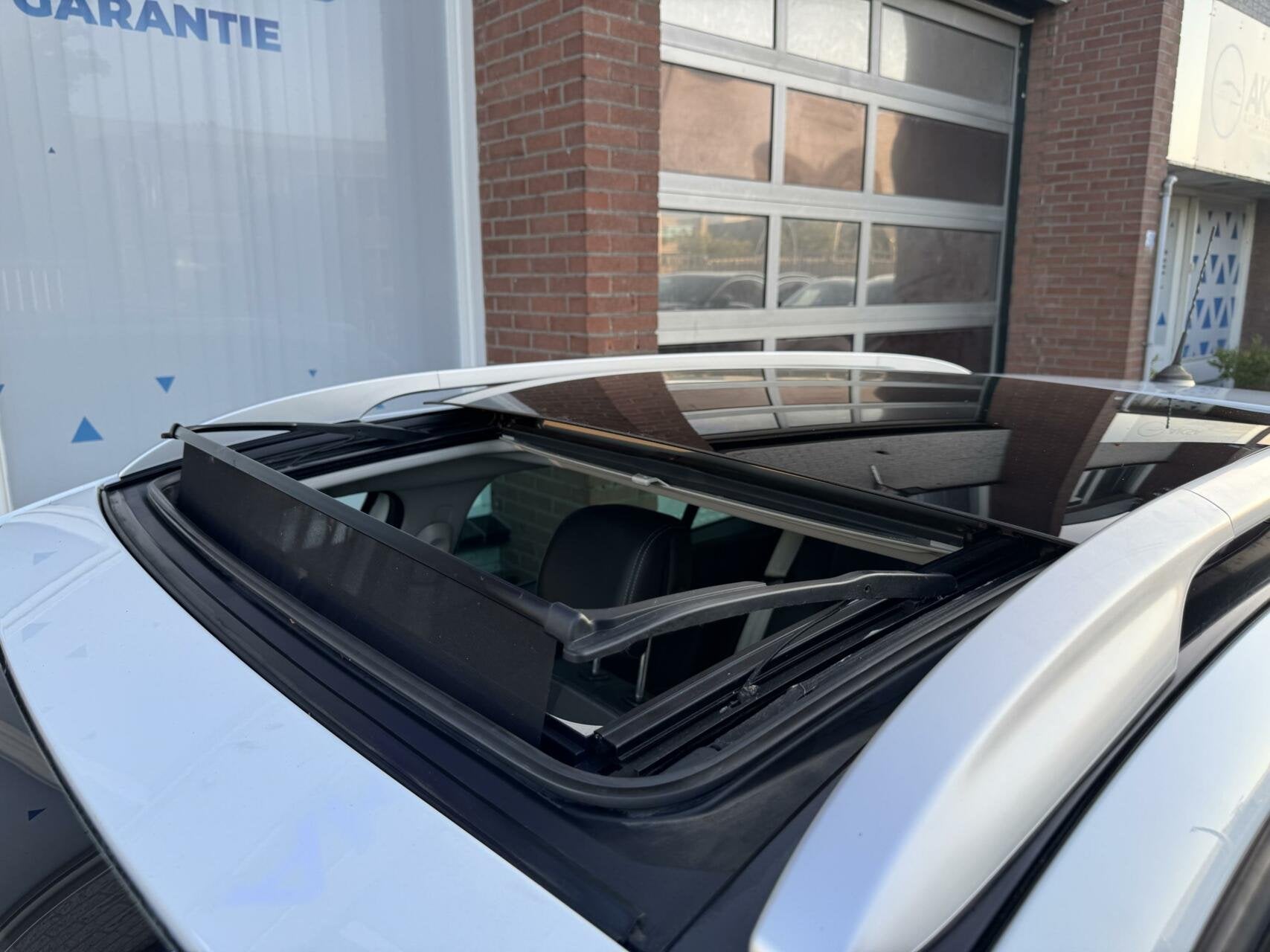 Renault Megane Estate 1.4 TCe Bose Schuifdak Cruise Navi Spo, Auto's, Voorwielaandrijving, Euro 5, Gebruikt, 4 cilinders
