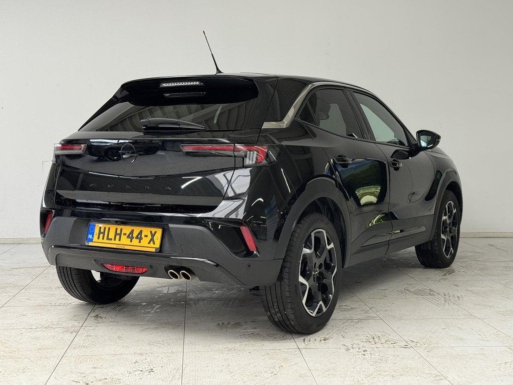 Opel Mokka 1.2 Turbo Ultimate | Achteruitrijcamera | Apple C, Auto's, Opel, 1195 kg, Gebruikt, 1199 cc, Met garantie (alle)