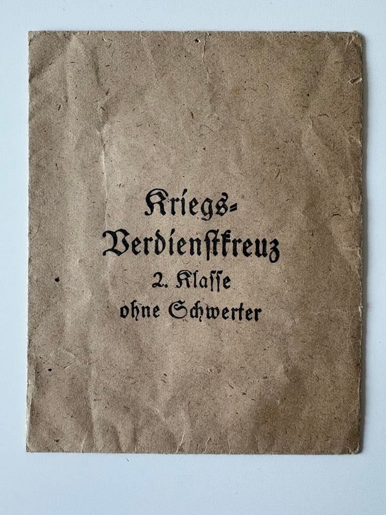 WW2 Originele envelop voor een Duitse medaille., Ophalen of Verzenden, Duitsland, Lintje, Medaille of Wings
