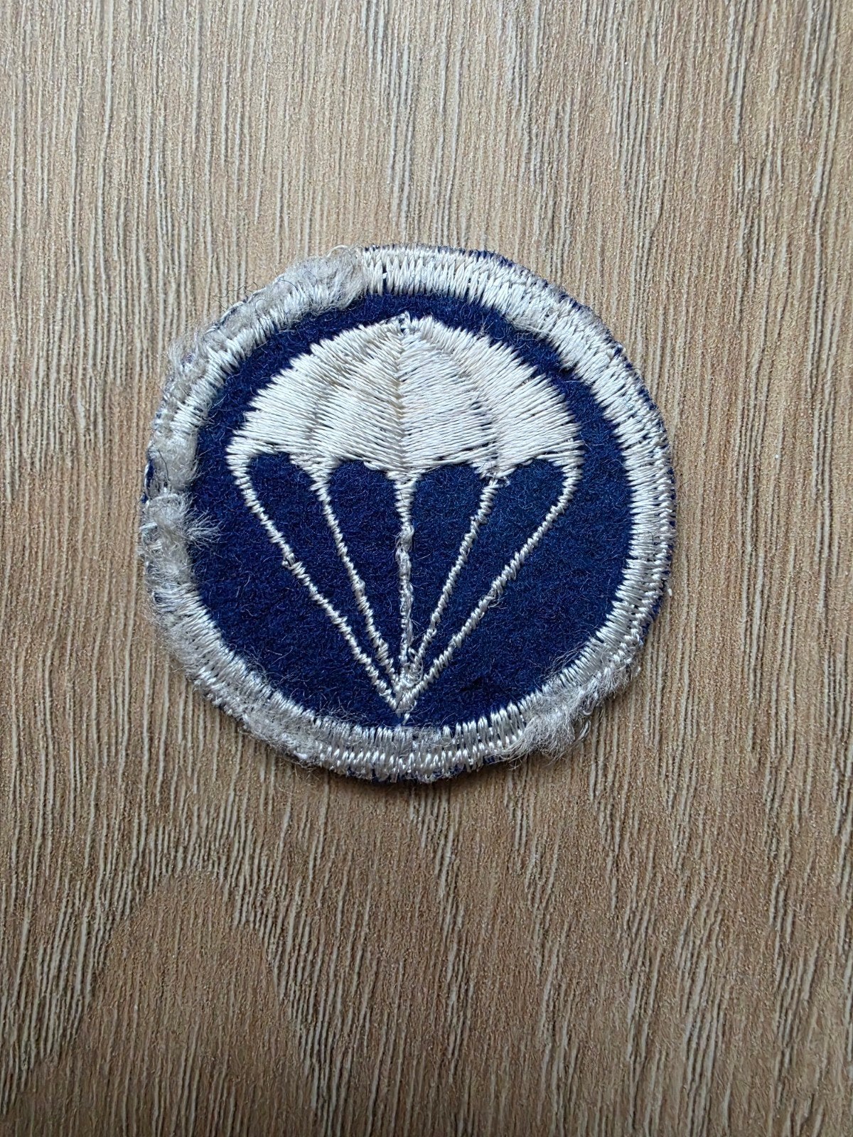 US WW2 Paratrooper Infantry cap patch wollen variant vroeg, Ophalen of Verzenden, Amerika, Embleem of Badge