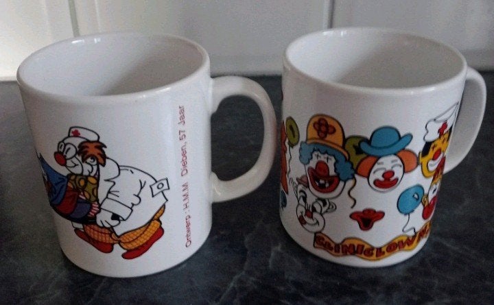 2 mokken CliniClowns 1996, Ophalen, Overige stijlen, Kop(pen) en/of Schotel(s)