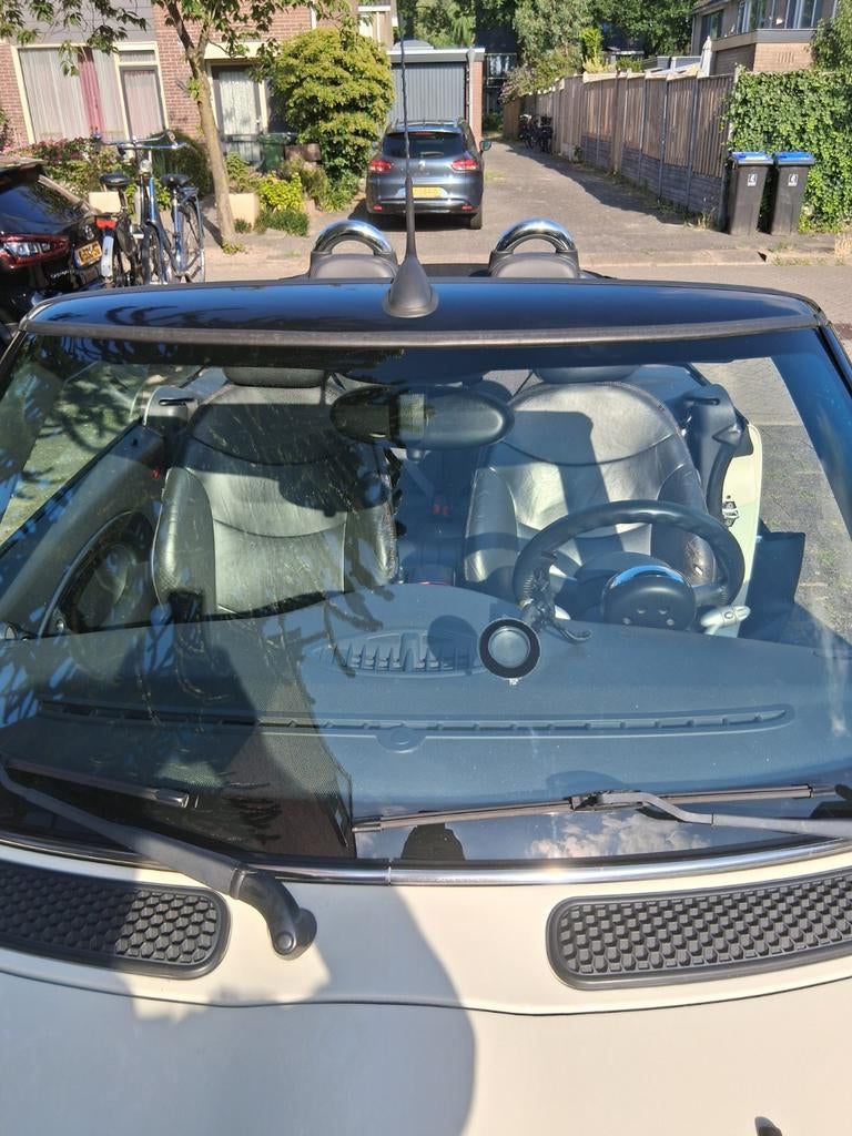 Mini 1.6 16V Cooper Cabrio 2007 Wit, Auto's, Voorwielaandrijving, 4 cilinders, Cabriolet, 4 stoelen