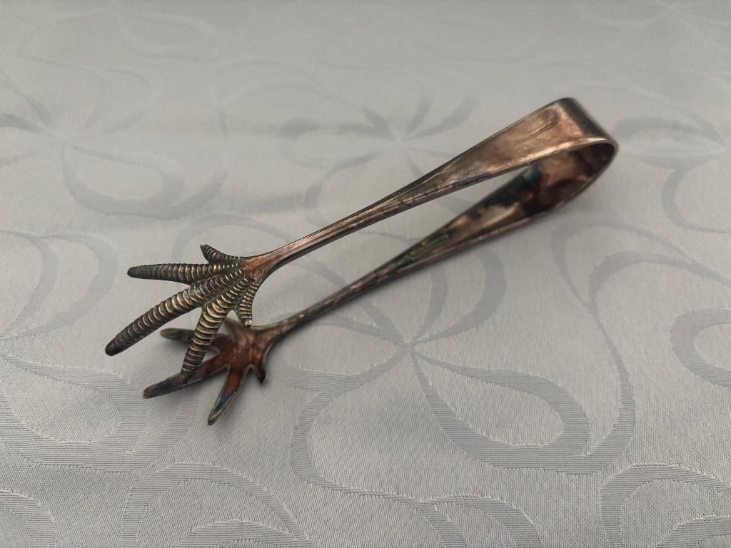 Antieke verzilverd metalen ijsklontjestang met klauwen., Ophalen of Verzenden