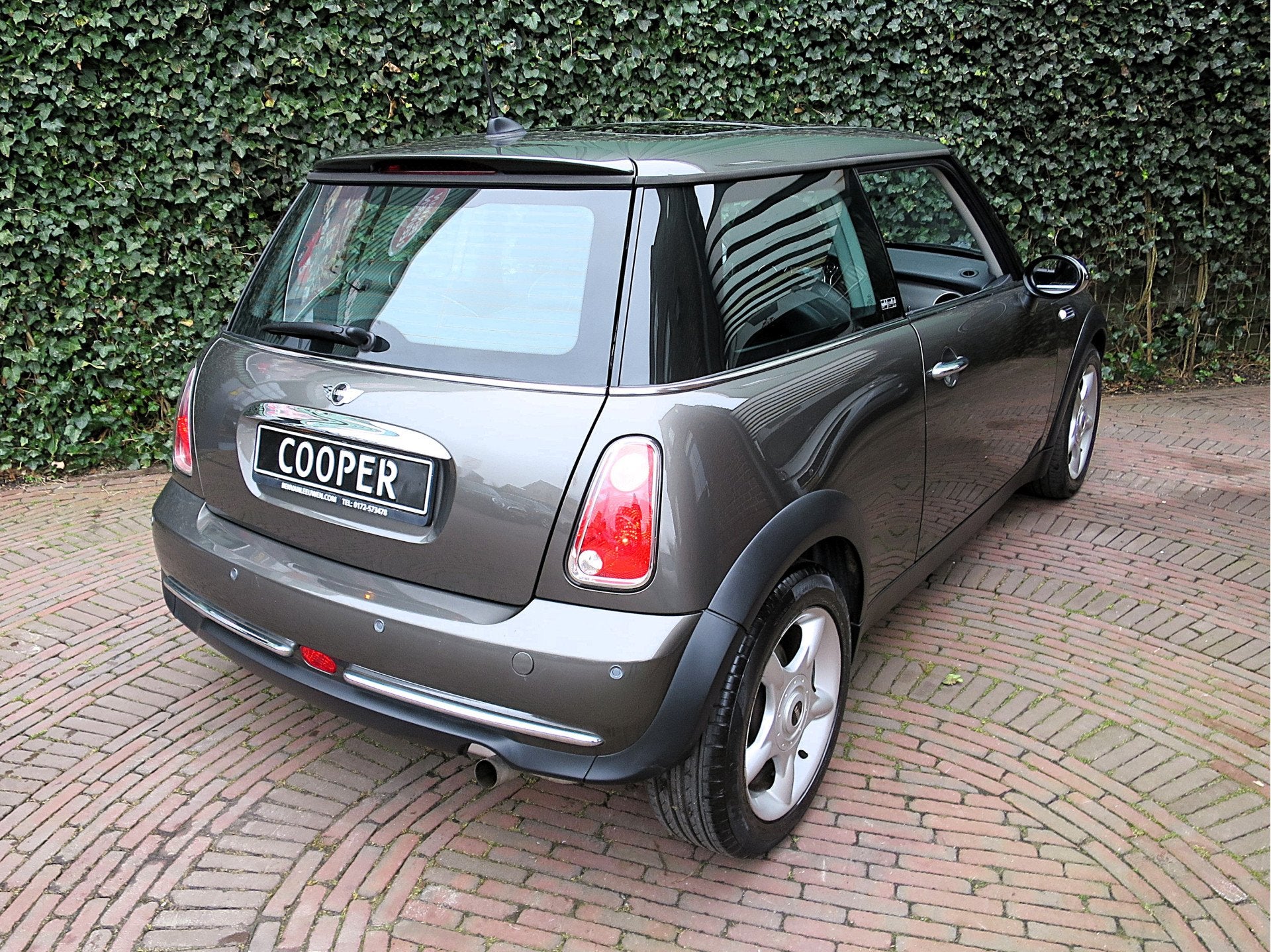 MINI Cooper 1.6 Park Lane R50 met Pano.dak, Leer, PDC, Clima, Auto's, 15 km/l, Gebruikt, Huisgarantie, 4 cilinders