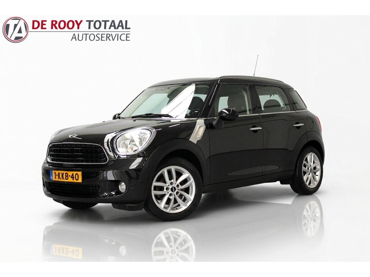MINI Countryman 1.6 One Holland Street 98PK, HALF LEER | NAV, Auto's, Mini, Voorwielaandrijving, Gebruikt, Leder en Stof, Zwart