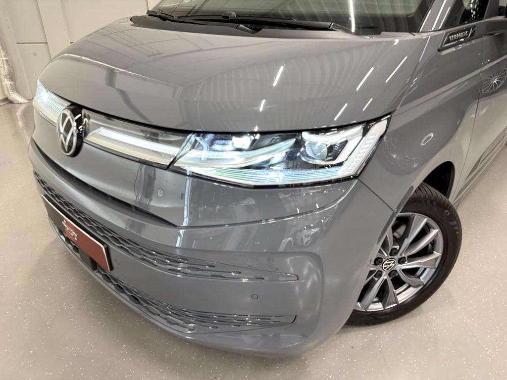 Volkswagen Multivan 1.4 eHybrid EDITION 7p. PANO/LEER/MASSAG, Auto's, Gebruikt, Zwart, Met garantie (alle), 7 stoelen