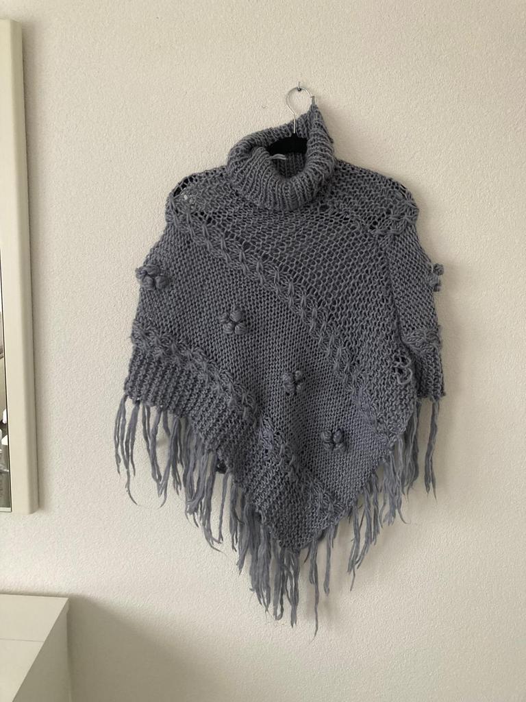Nieuw poncho 44, Ophalen of Verzenden, Zo goed als nieuw