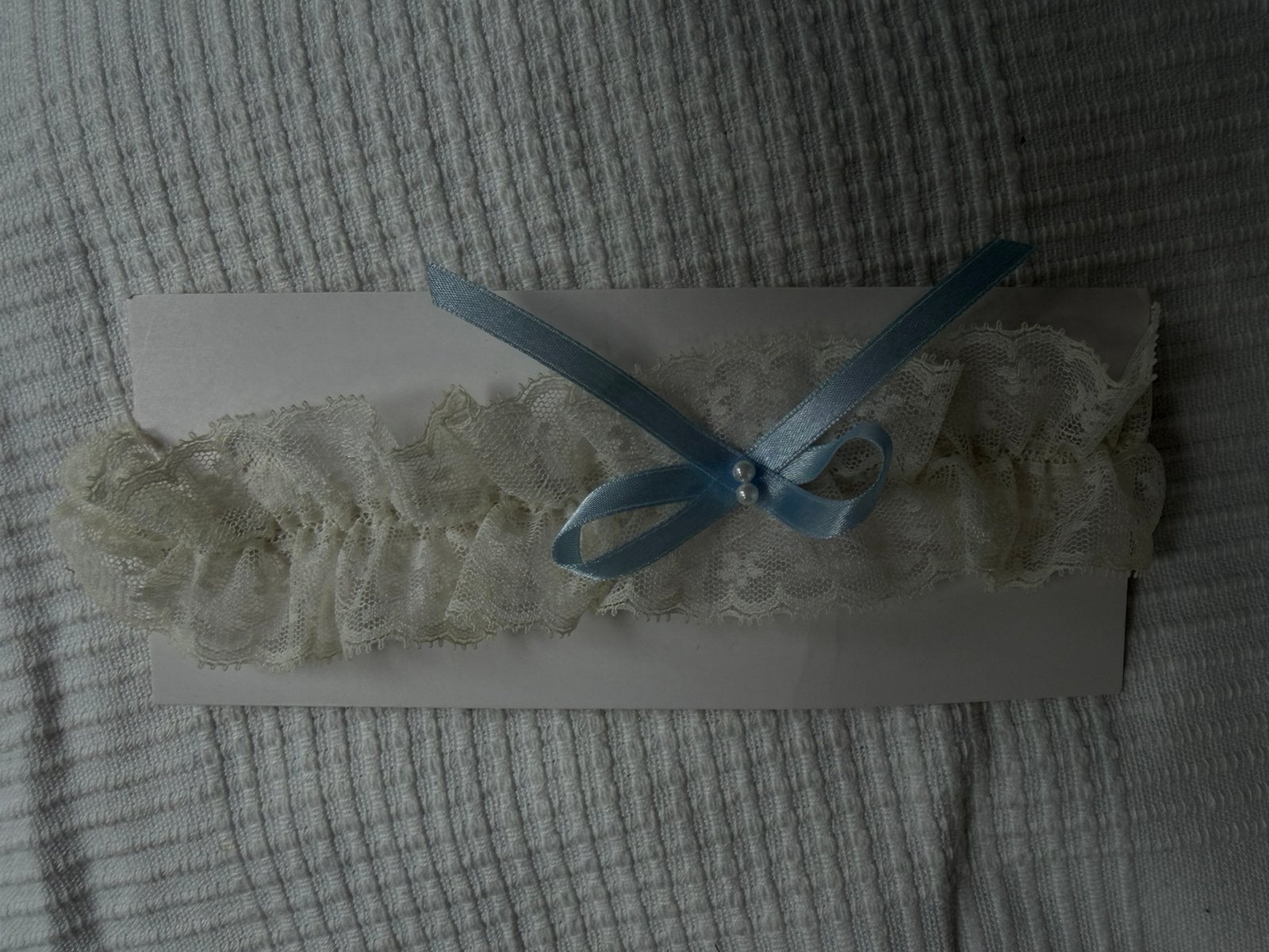 Poirier bruidsstrumpfband — ivory/blauw, Kleding | Dames, Trouwkleding en Trouwaccessoires, Ophalen of Verzenden, Zo goed als nieuw