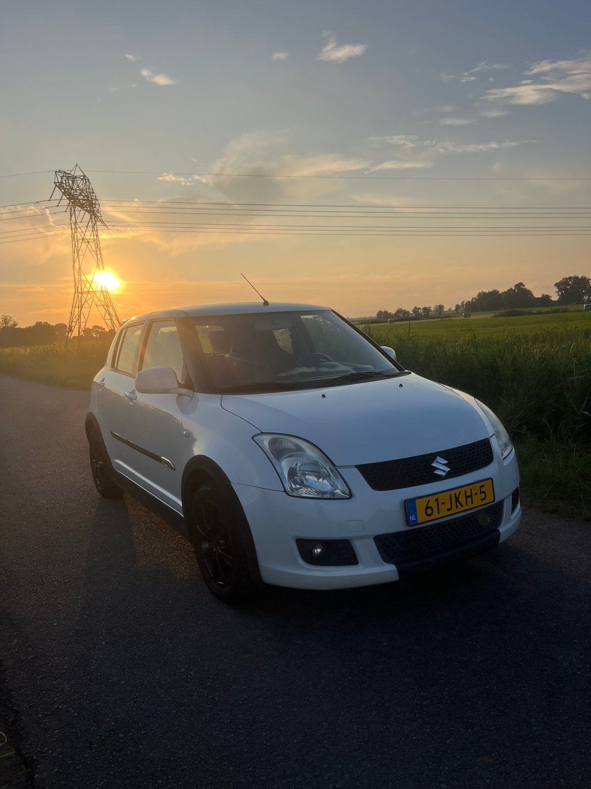 Suzuki Swift 1.3 5D 2009 Wit, Auto's, Suzuki, Voorwielaandrijving, 40 €/maand, 400 kg, Origineel Nederlands