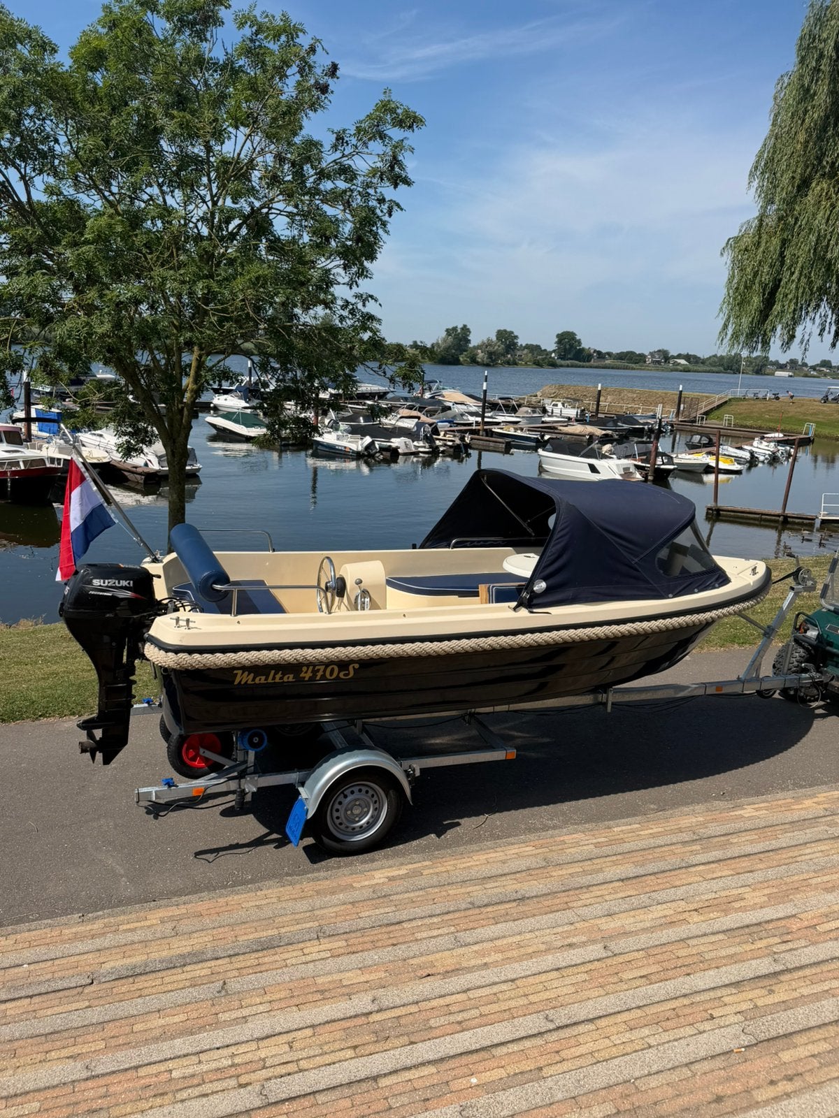 Malta 470 suzuki 15pk 4 takt inc nieuwe trailer nieuwstaat!, Ophalen, Zo goed als nieuw, Elektrische start