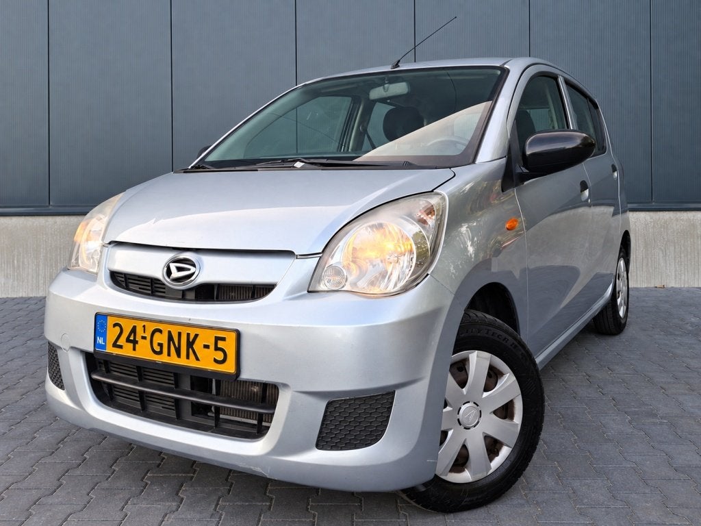 Daihatsu Cuore 1.0 Premium | NAP | 5 deurs | Stuurbekrachtig, Auto's, Dealer onderhouden, Stof, 18 €/maand, 4 stoelen