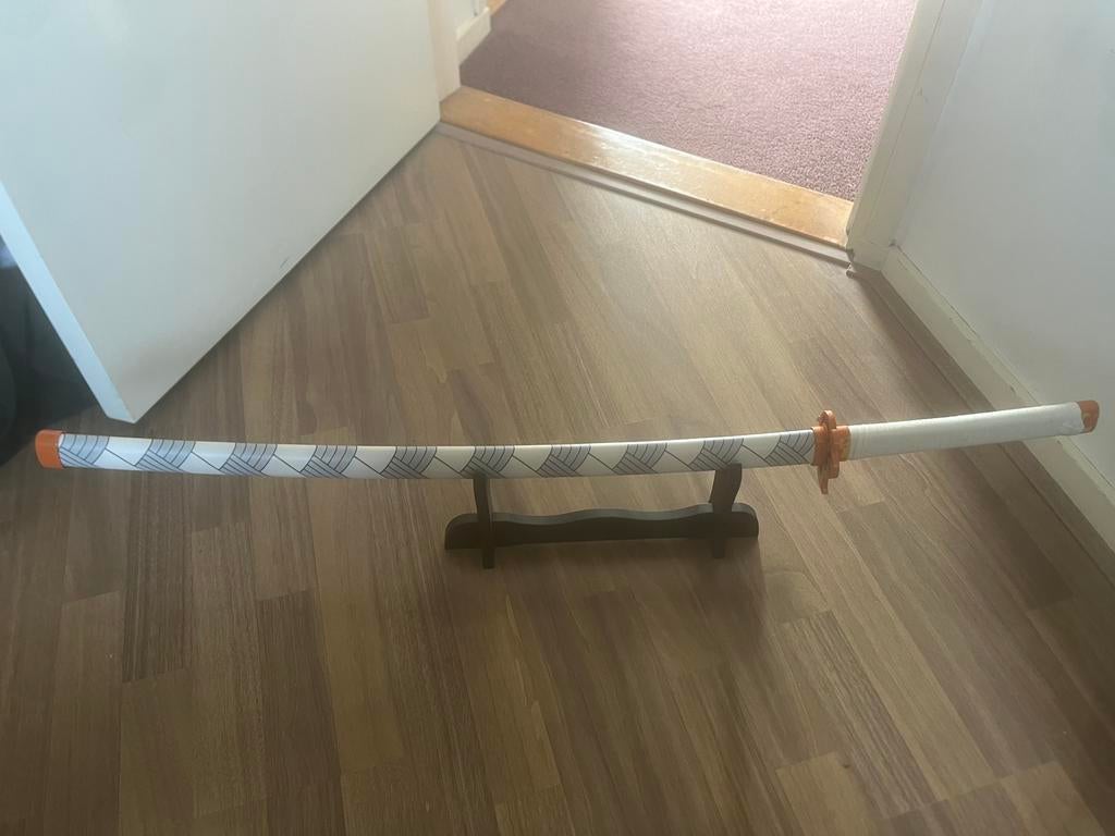 Scherpe katana demon slayer katana, merk is mini katana, Ophalen of Verzenden, Zo goed als nieuw