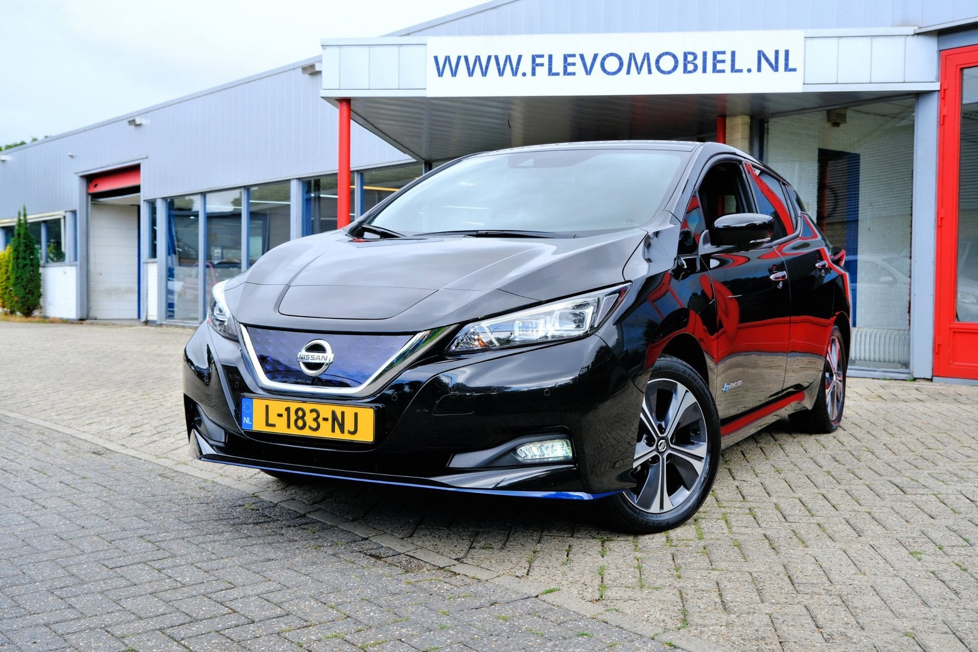 Nissan LEAF E+ Tekna 62 kWh Long Range Aut. Leder|1e Eig|360, Auto's, Nissan, Dealer onderhouden, Gebruikt, Zwart, 62 kWh
