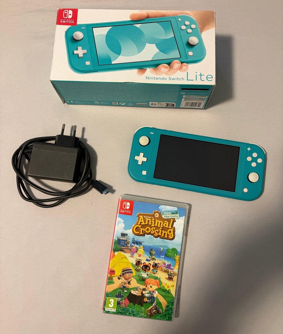 Nintendo Switch Turquoise + Animal Crossing + Doos, Spelcomputers en Games, Ophalen of Verzenden, Zo goed als nieuw, H, N