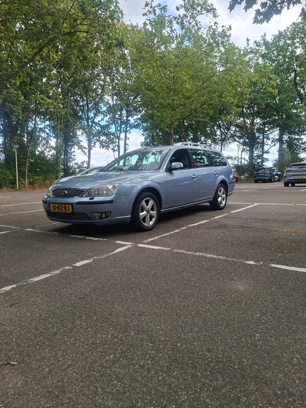 Ford Mondeo 1.8 16V 92KW Wagon 2005 Grijs, Auto's, Zwart, 4 cilinders, Leder en Stof, Origineel Nederlands