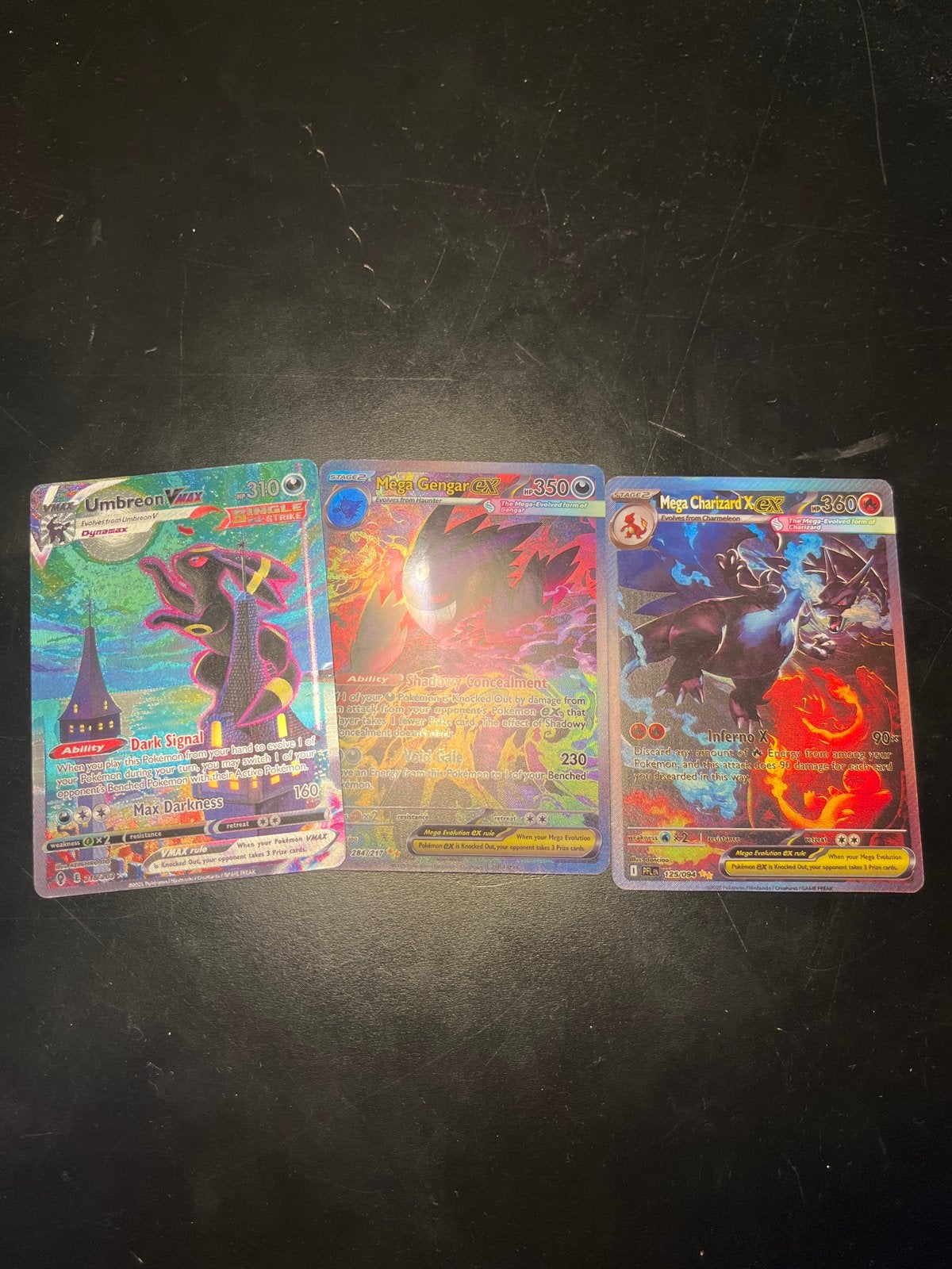 Pokémon Kaarten: Umbreon VMAX, Mega Gengar EX, Mega Charizar, Ophalen of Verzenden, Zo goed als nieuw, Meerdere kaarten, Foil
