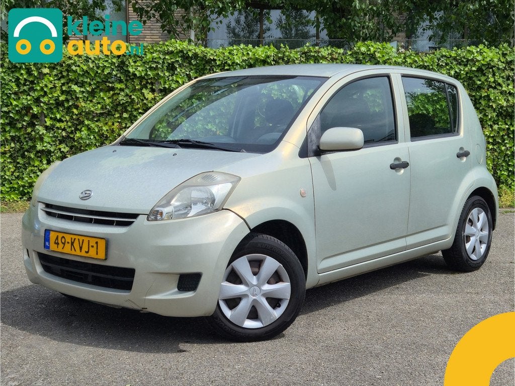 Daihatsu Sirion 2 1.0-12V Premium Zie tekst! (bj 2010), Auto's, Voorwielaandrijving, Stof, Gebruikt, Beige