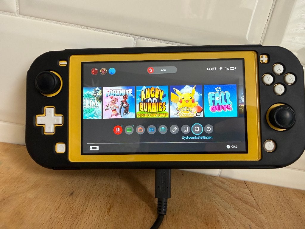 Nintendo Switch Lite Geel + oplader + hardcase, Ophalen of Verzenden, Geel, Zo goed als nieuw, Met beschermhoes of tas