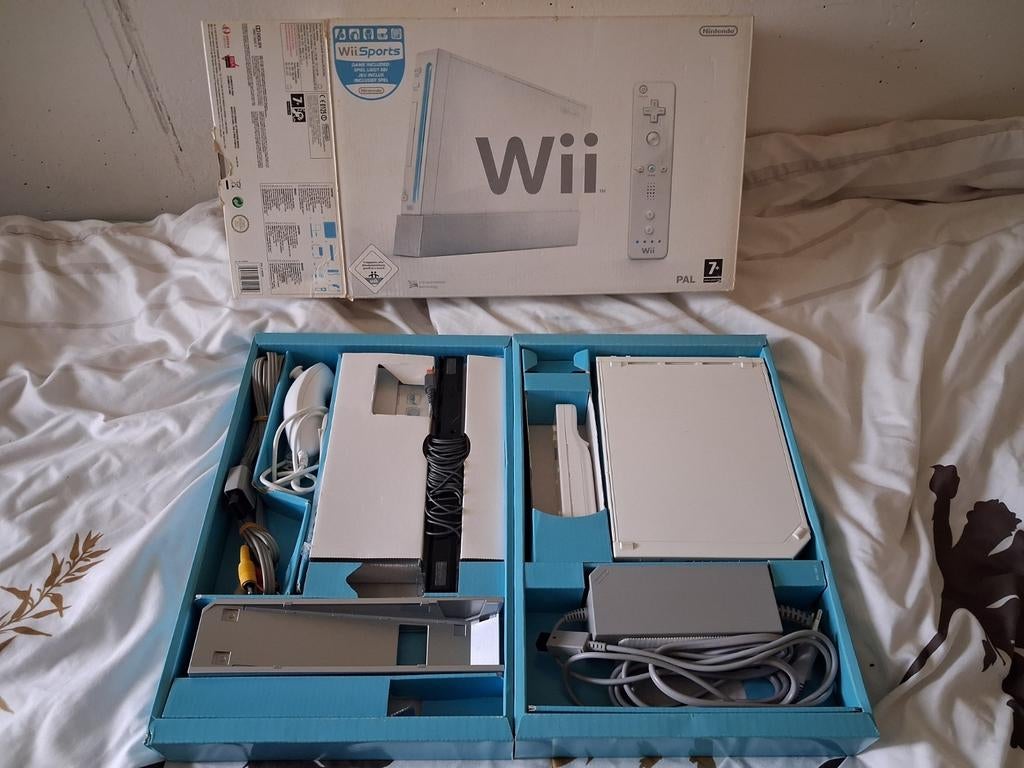 Wii Compleet in Doos - Inclusief Wii Sports, Ophalen of Verzenden, Zo goed als nieuw, Met 1 controller, Met games