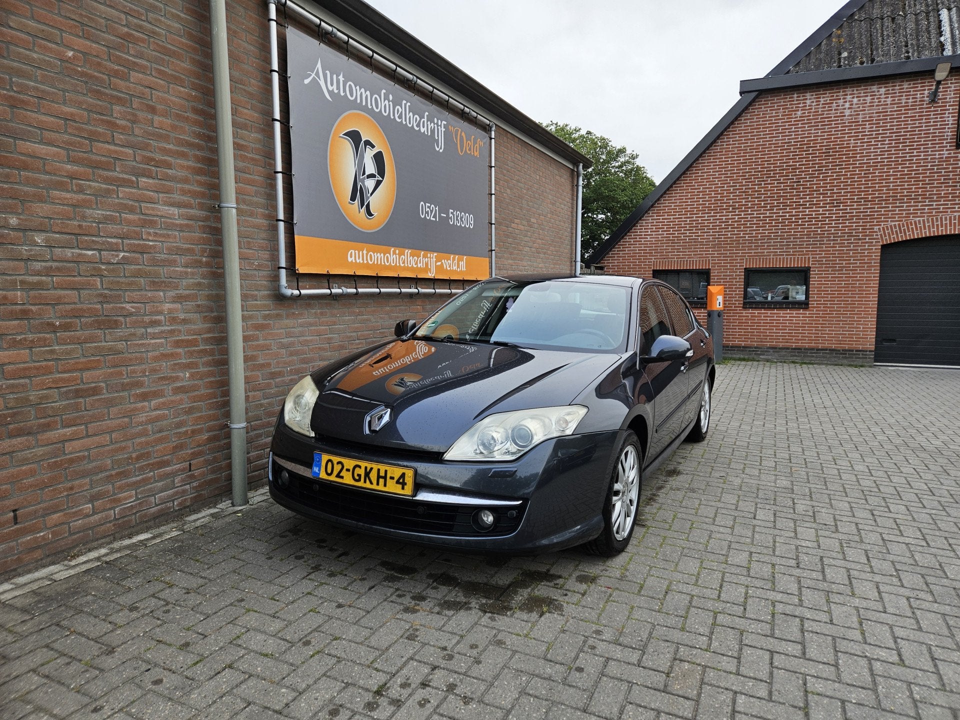 Renault Laguna 2.0 16V T Initiale (bj 2008, automaat), Gebruikt, Zwart, 4 cilinders, Bedrijf