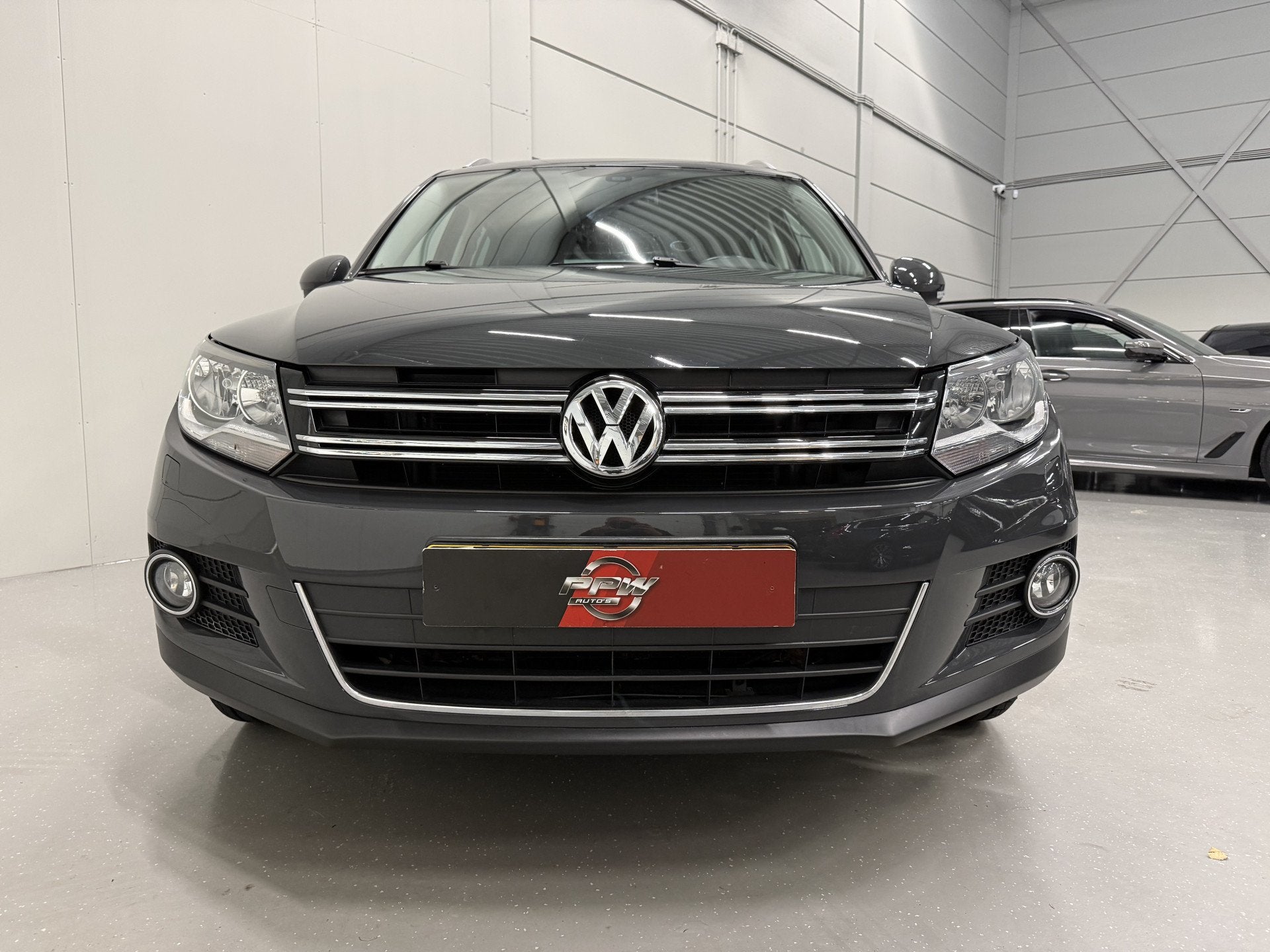 Volkswagen Tiguan 1.4 TSI 150PK Sport&Style aut. TREKHAAK/NA, Dealer onderhouden, 4 cilinders, 1405 kg, Verwarmde buitenspiegels