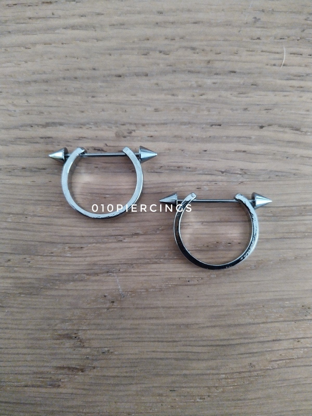 Nieuwe tepelpiercing., Ophalen of Verzenden, Zo goed als nieuw, Staal, Oor- of Traguspiercing