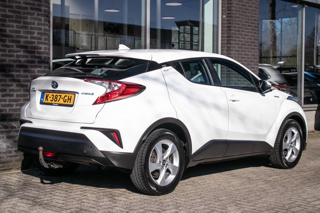 Toyota C-HR 1.8 Hybrid Dynamic | Camera | Navigatie | Stoelv, Auto's, Toyota, Stof, 4 cilinders, 116 pk, Wit