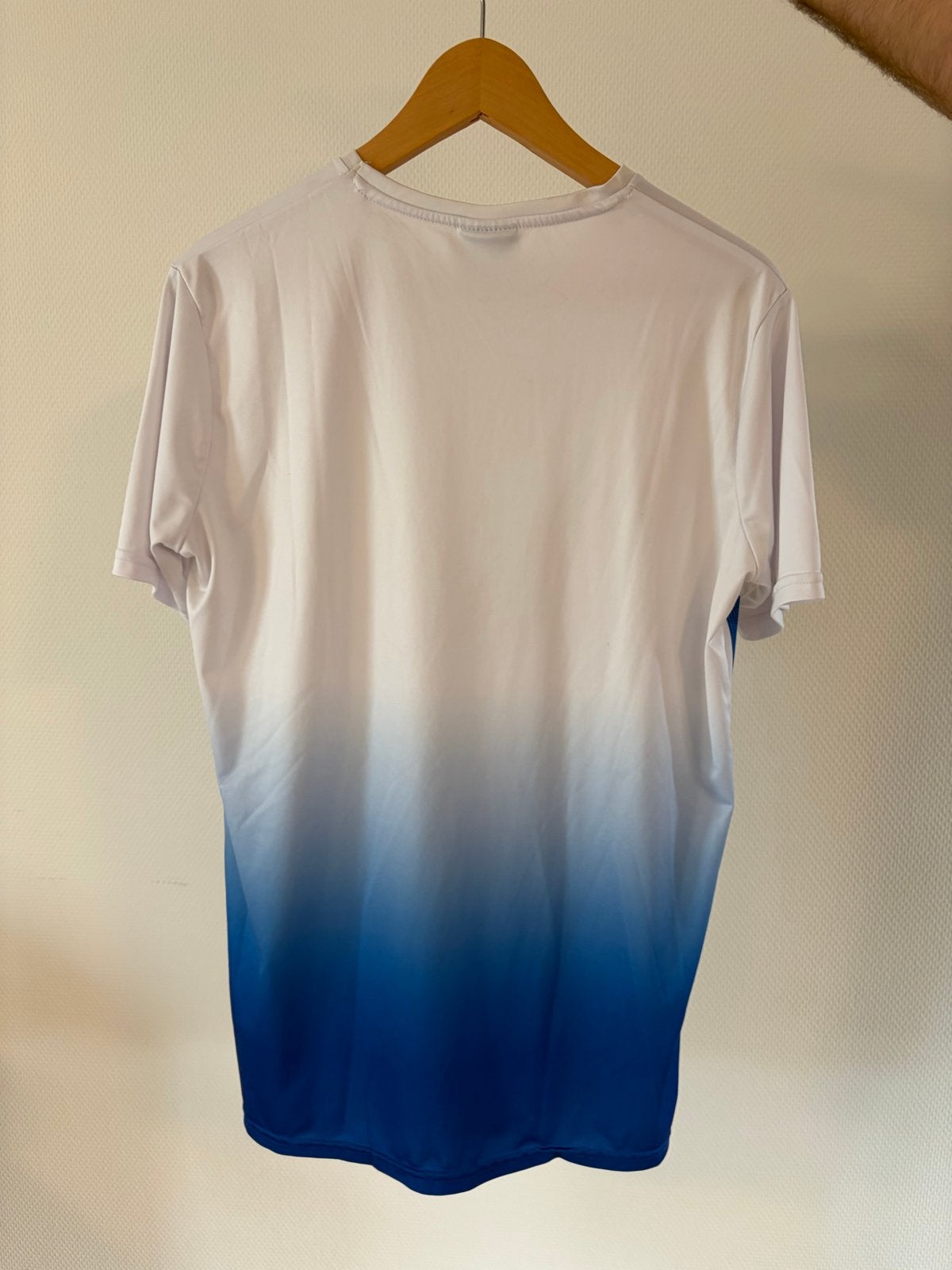 Lotto sportshirt - Wit/Blauw - Maat L, Maat 52/54 (L), Wit, Ophalen of Verzenden, Zo goed als nieuw