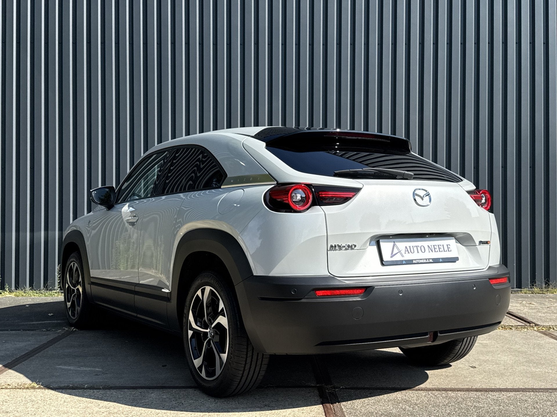 Mazda MX-30 e-SkyActiv R-EV PHEV 170 Makoto Memory Bose, Cam, Auto's, Dealer onderhouden, Gebruikt, Met garantie (alle), Leder en Stof
