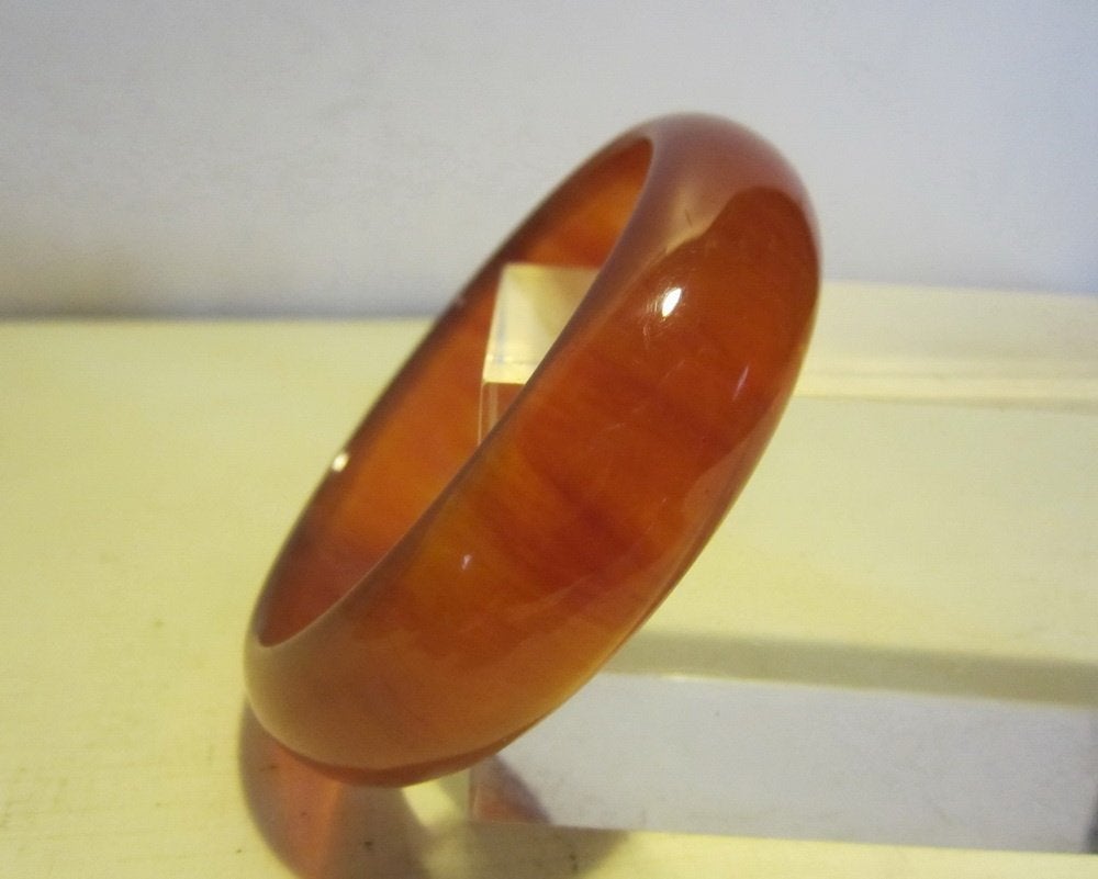 Originele, vintage armband in amberkleurig bakeliet, getest, Verzenden, Overige materialen, Armband