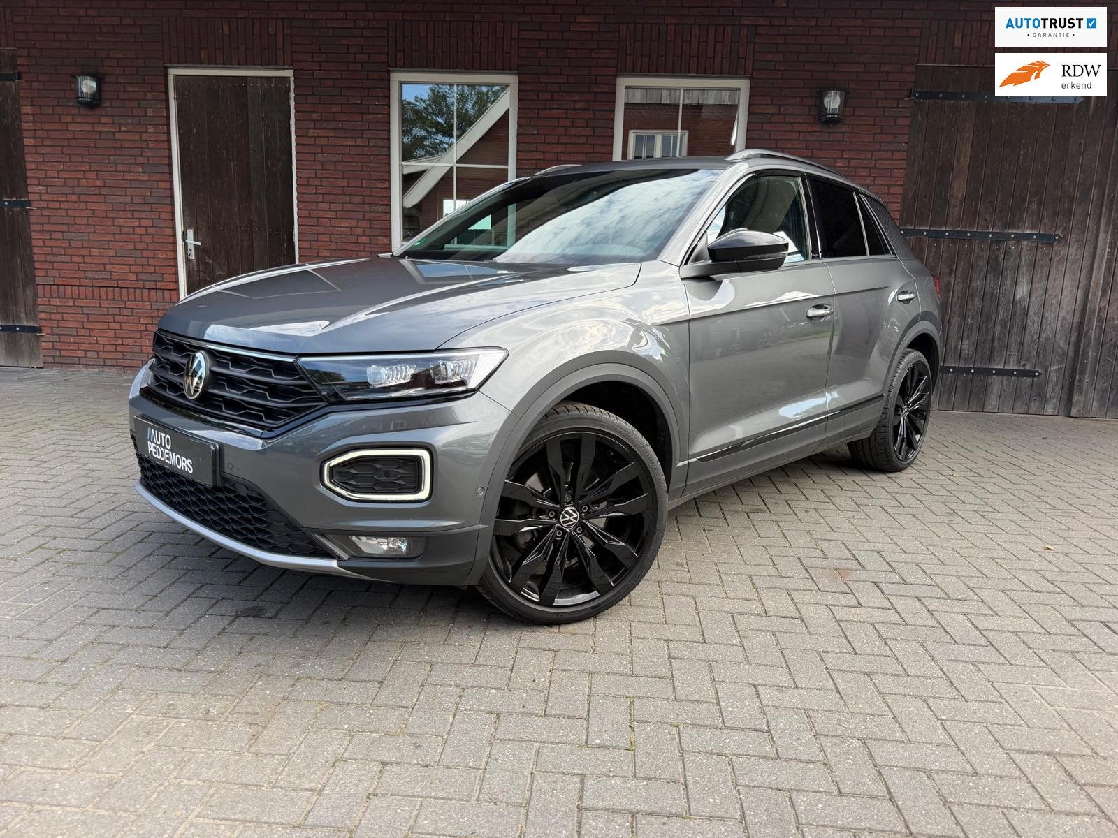 Volkswagen T-Roc 1.5 TSI Sport |Trekhaak| LED| ACC| Blindspo, Auto's, 4 cilinders, 150 pk, Leder en Stof, Bedrijf