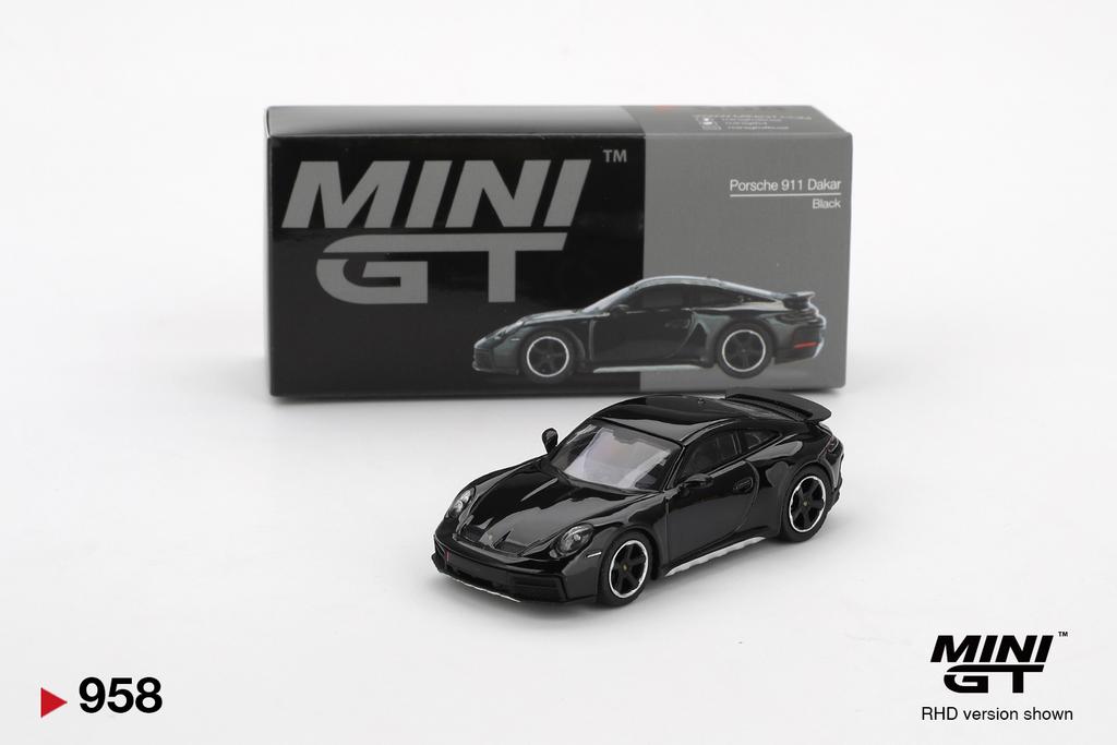 Mini GT Porsche 911 dakar, Hobby en Vrije tijd, Modelauto's | Overige schalen, Ophalen of Verzenden, Zo goed als nieuw, Auto