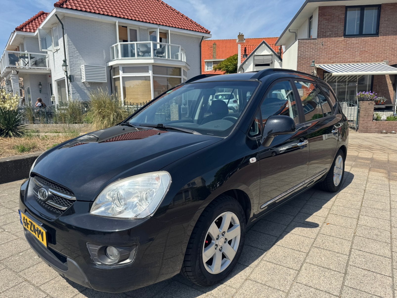 Kia Carens 2.0 Cvvt 7-ZIT 2008 Zwart, Auto's, Kia, Voorwielaandrijving, 1998 cc, 4 cilinders, 700 kg