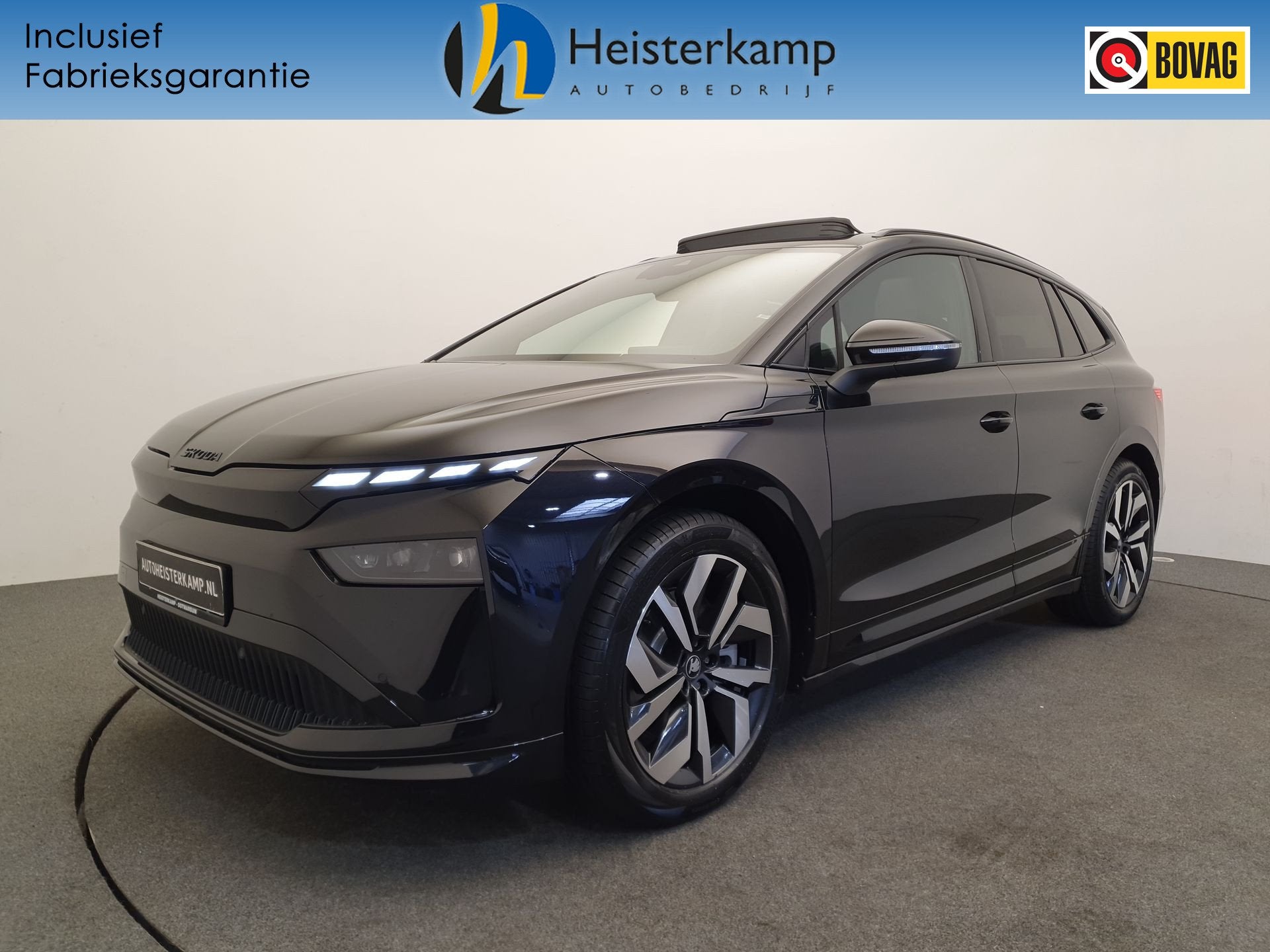 Skoda Enyaq 85 Sportline 82 kWh 286pk Wegklapbare trekhaak,, Auto's, Skoda, Automaat, Achterwielaandrijving, Zwart, Alcantara