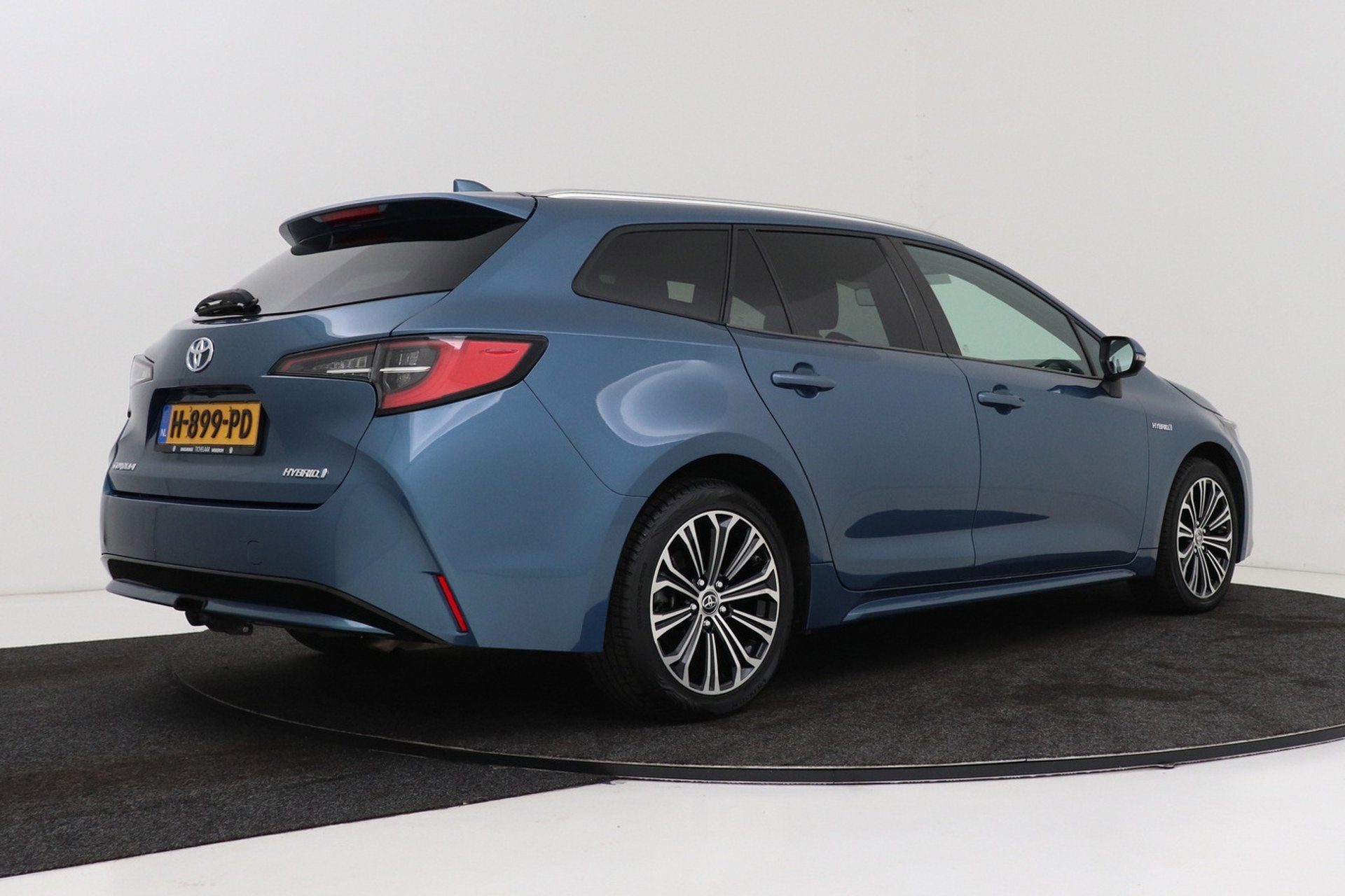 Toyota Corolla Touring Sports 1.8 Hybrid Business Plus | Org, Auto's, Gebruikt, 4 cilinders, Blauw, Corolla
