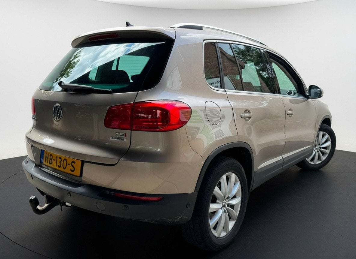 Volkswagen Tiguan 1.4 TSI SPORT&STYLE TREKHAAK/PDC/NAVIGATIE, 15 km/l, Gebruikt, Zwart, 4 cilinders