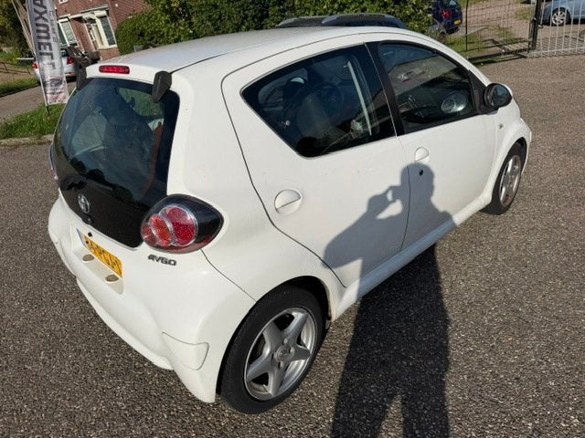 Toyota Aygo 1.0-12V Comfort Navigator Airco Navigatie APK 08, Auto's, Voorwielaandrijving, Euro 5, Stof, Gebruikt