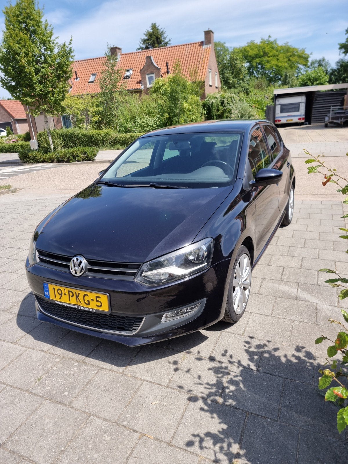 Volkswagen Polo 1.2 TSI 77KW 2011 Zwart, Auto's, Voorwielaandrijving, Stof, 40 €/maand, Zwart