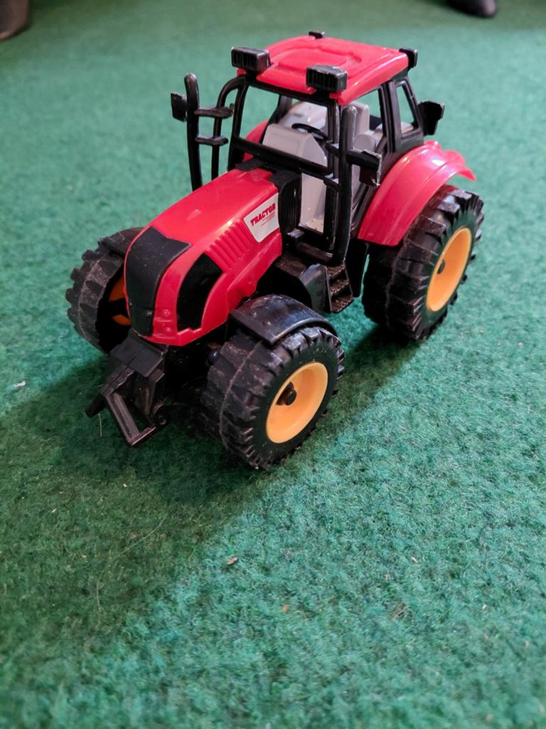 Speelgoed tractor, Ophalen