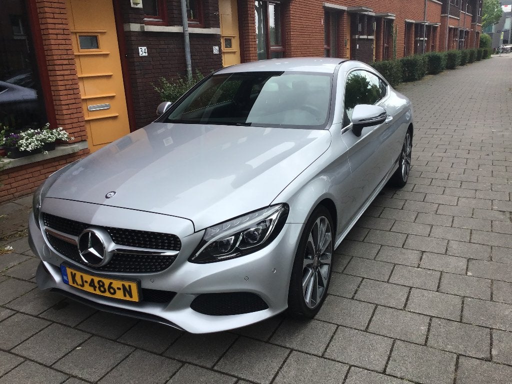 Mercedes-Benz C-Klasse 1.6 C180 BE Coupe 2016 Grijs, Auto's, Achterwielaandrijving, 4 stoelen, Handgeschakeld, Particulier