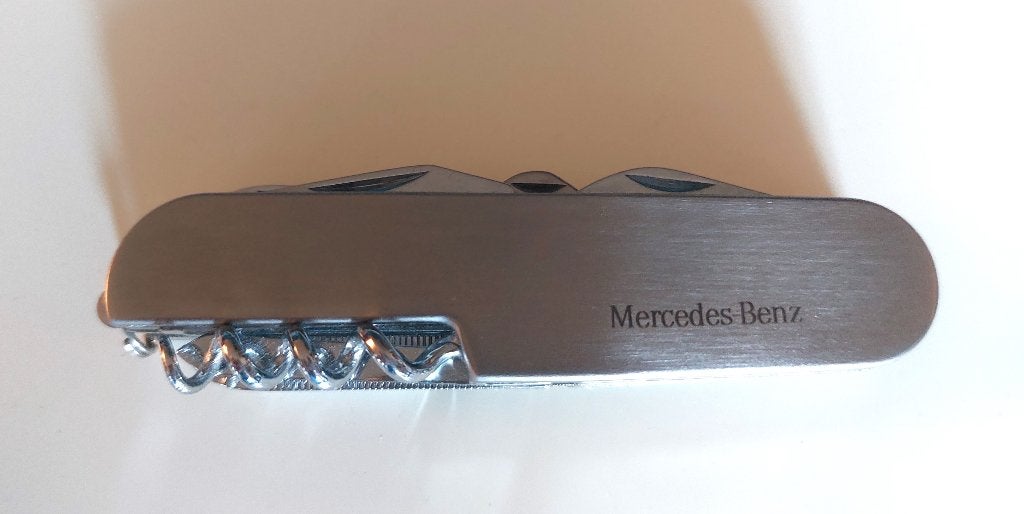 Mercedes Benz - 11-delig RVS zakmes in Leder hoesje, Ophalen of Verzenden, Zo goed als nieuw