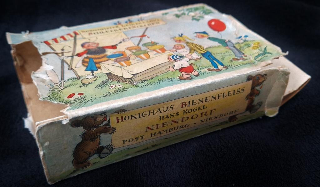 Oud reclame doosje m. 7 dekselpotjes Honighaus Bienenfleiss, Ophalen of Verzenden, Gebruikt, Verpakking
