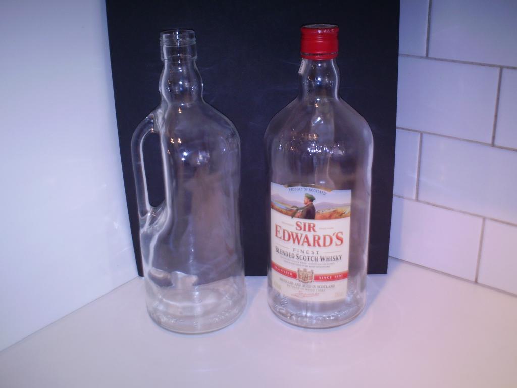 Lege whisky flessen - maat 2,5 liter. (03/30)., Ophalen of Verzenden