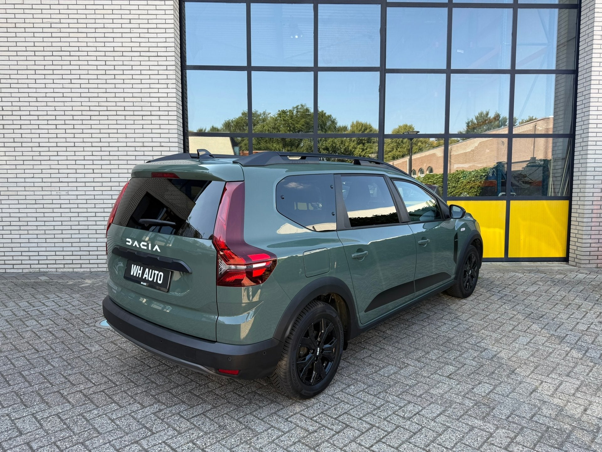 Dacia Jogger 1.6 Hybrid 140 Extreme 7p., Auto's, Dacia, Stof, 4 cilinders, 7 stoelen, Bedrijf