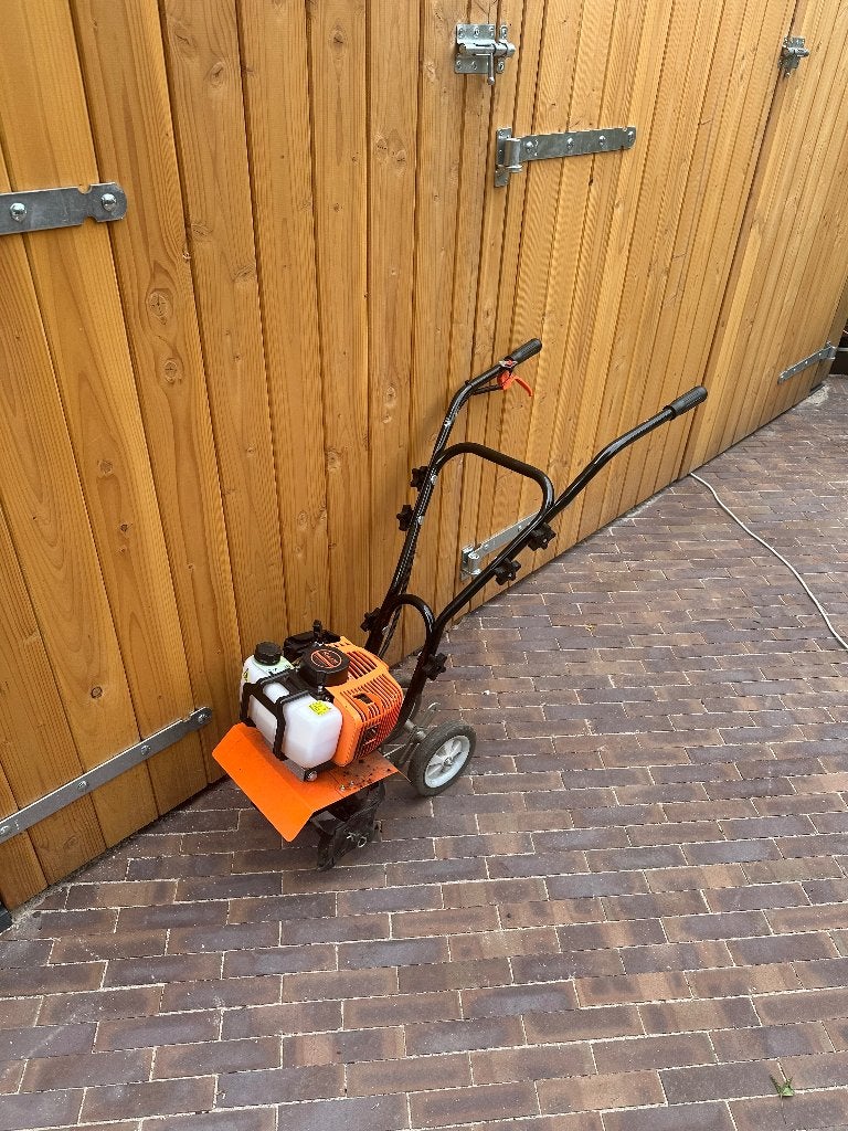 Te huur - Kibani Grondfrees op benzine, Ophalen, Gebruikt, Benzine, Tuinfrees