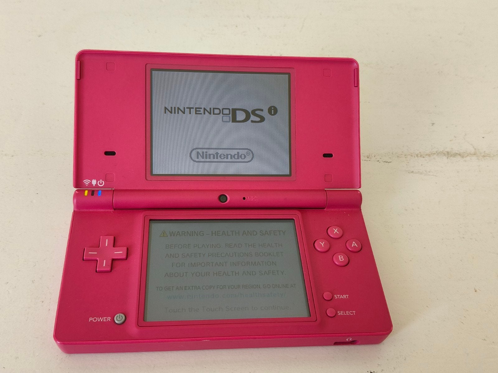 Roze Nintendo DSi met Super Mario Bros. en oplader, Met games, Dsi, Ophalen of Verzenden, Zo goed als nieuw