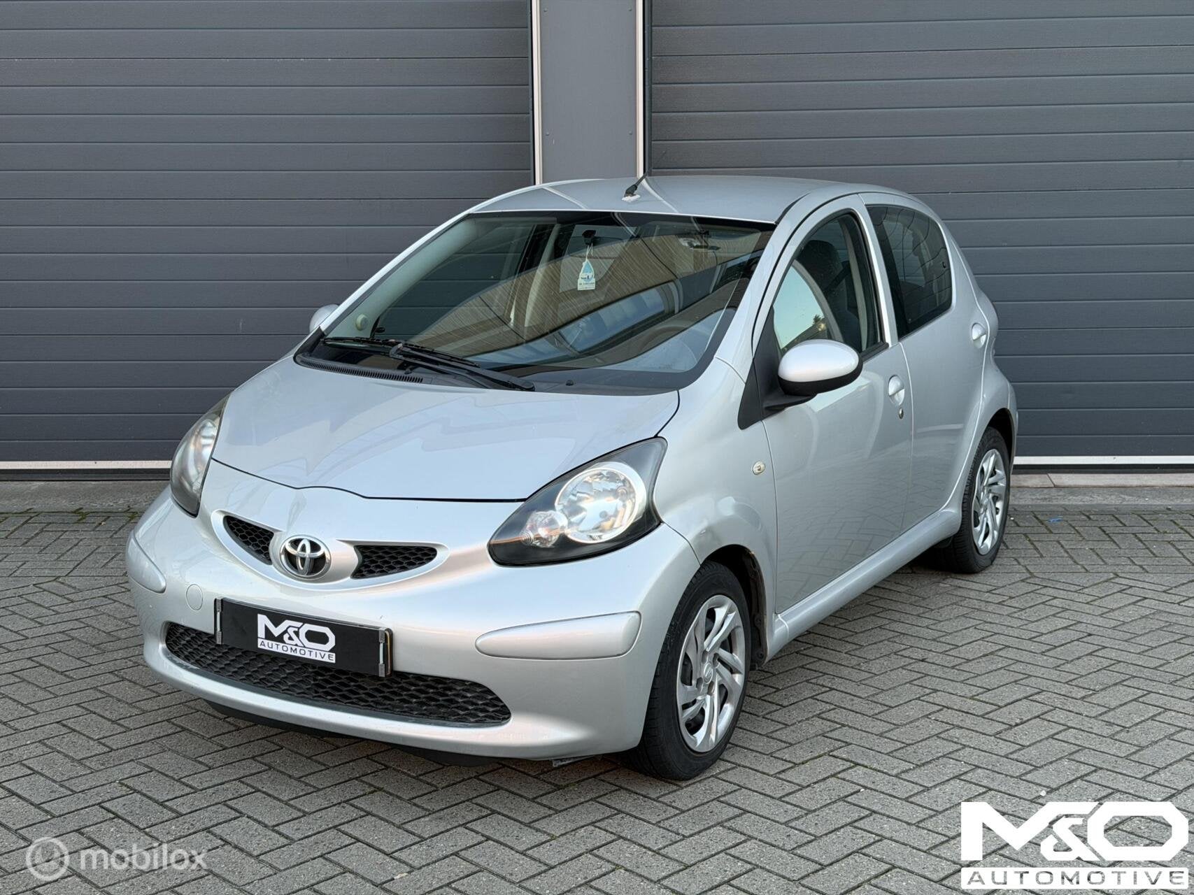 Toyota Aygo 1.0-12V + | AIRCO | E-RAMEN | APK, Auto's, Voorwielaandrijving, Stof, Gebruikt, Zwart