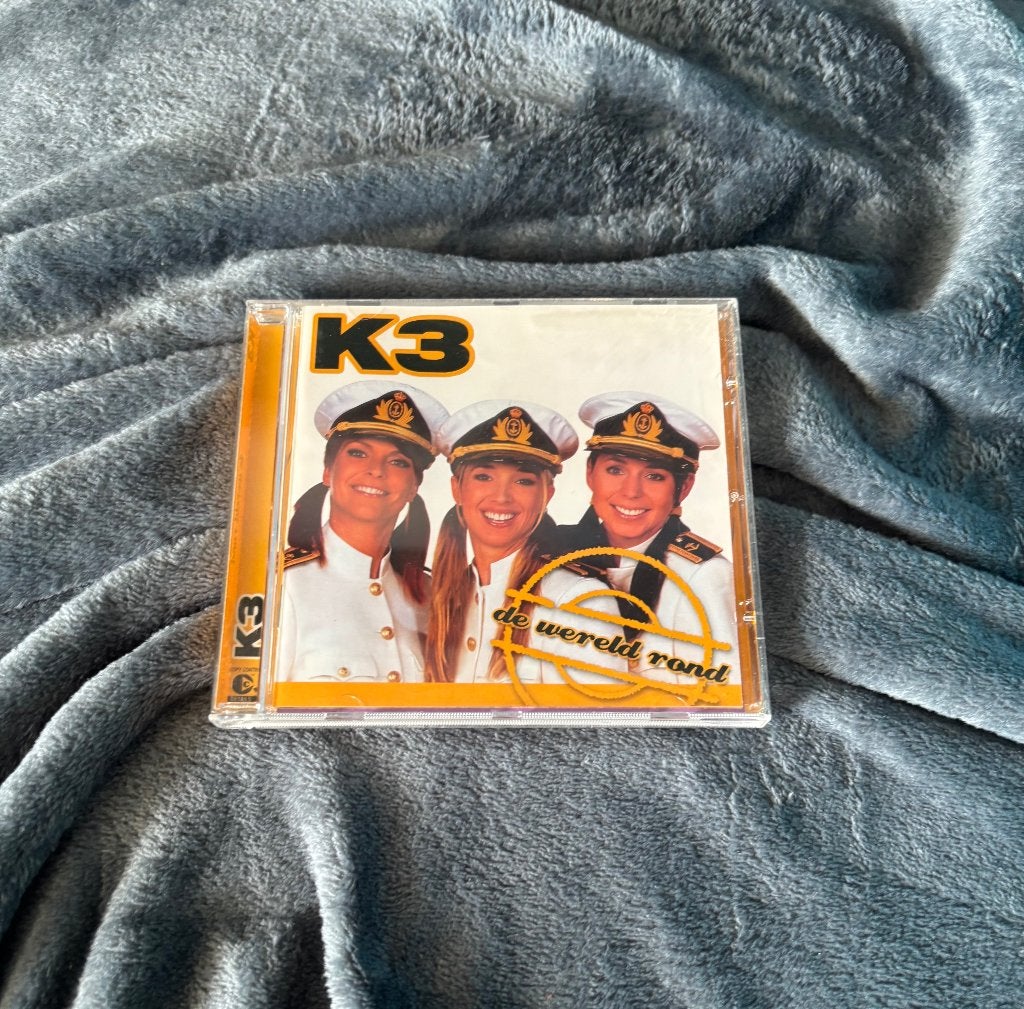 K3 Originals CD - De Wereld Rond, Cd's en Dvd's, Gebruikt, Verzenden, Inclusief doosje, Muziek