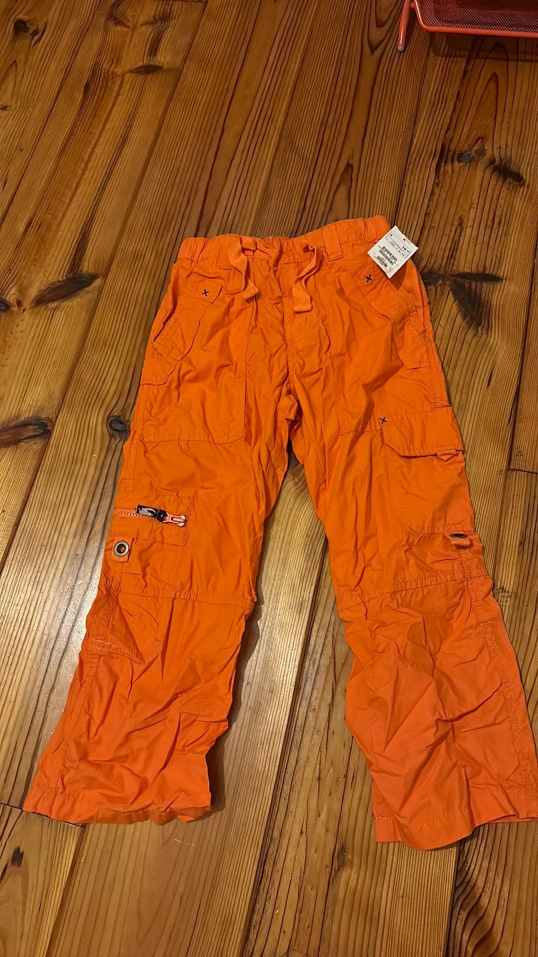 Nieuw; Leuke oranje broek maat 122, Kinderen en Baby's, Kinderkleding | Maat 122, Ophalen of Verzenden, Zo goed als nieuw, Meisje